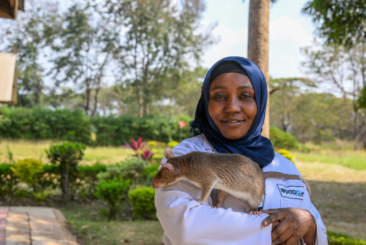 woman holding a HEROrat in her arms